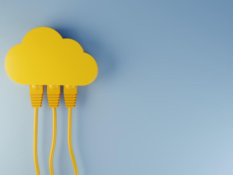 yellow cloud with ethernet cables connected, blue background visualizing cloud computing concept